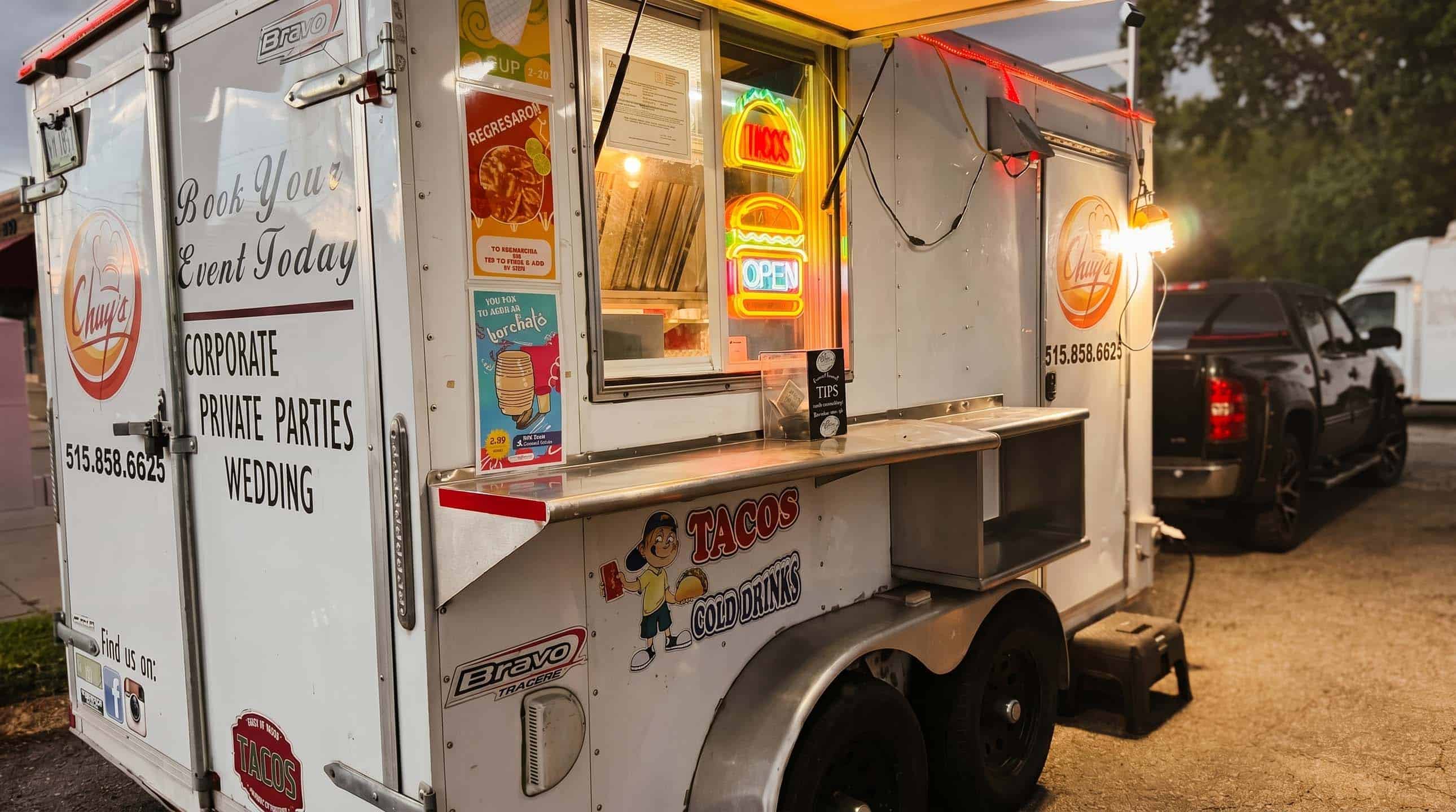 Chuy's Food Truck parked and open for business in the evening